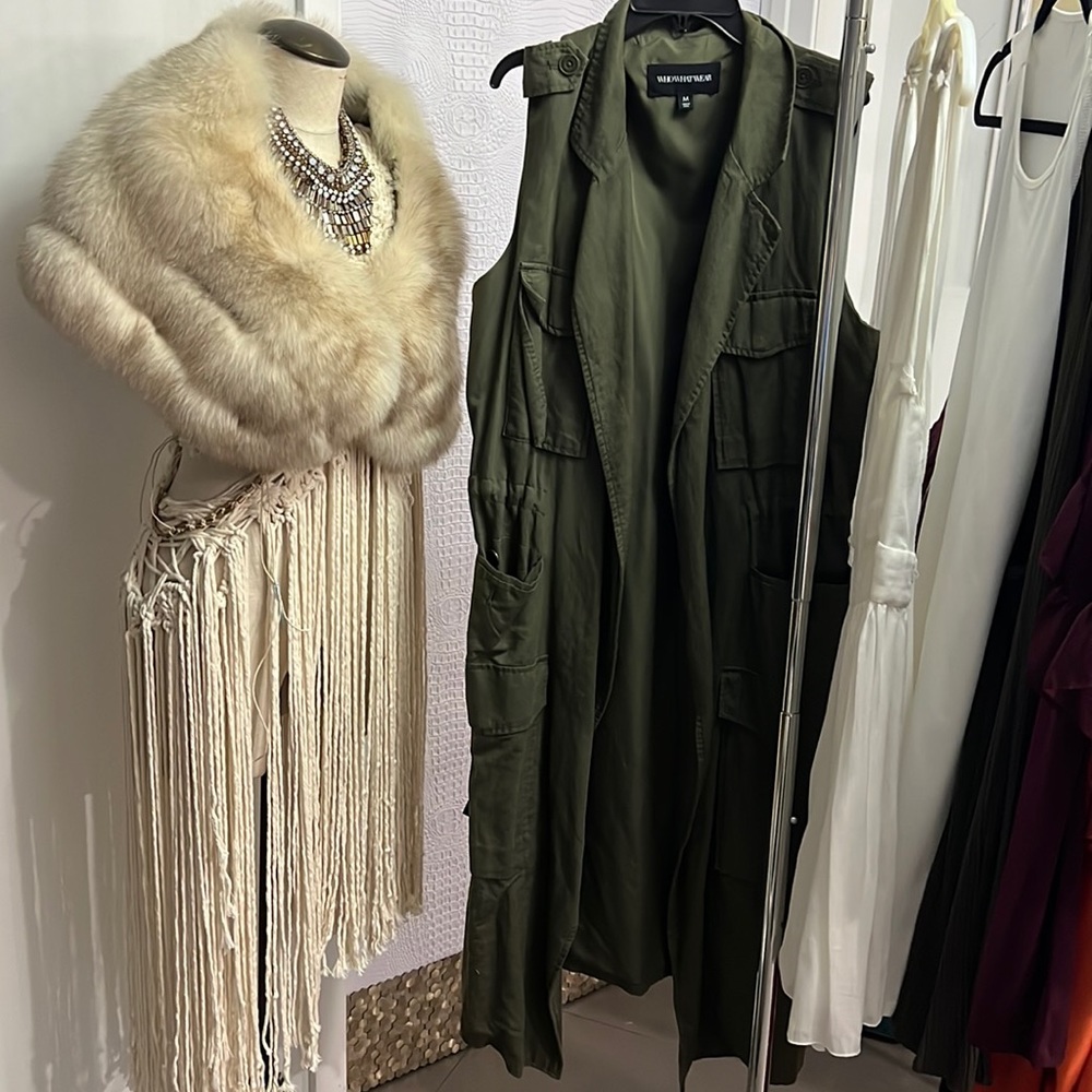 Cotton fully lined long vest with drawstring for gathering at waist.